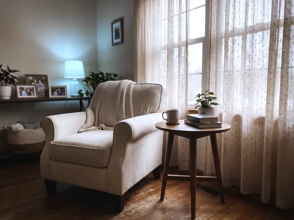 Warm home living room with family portraits, life insurance service